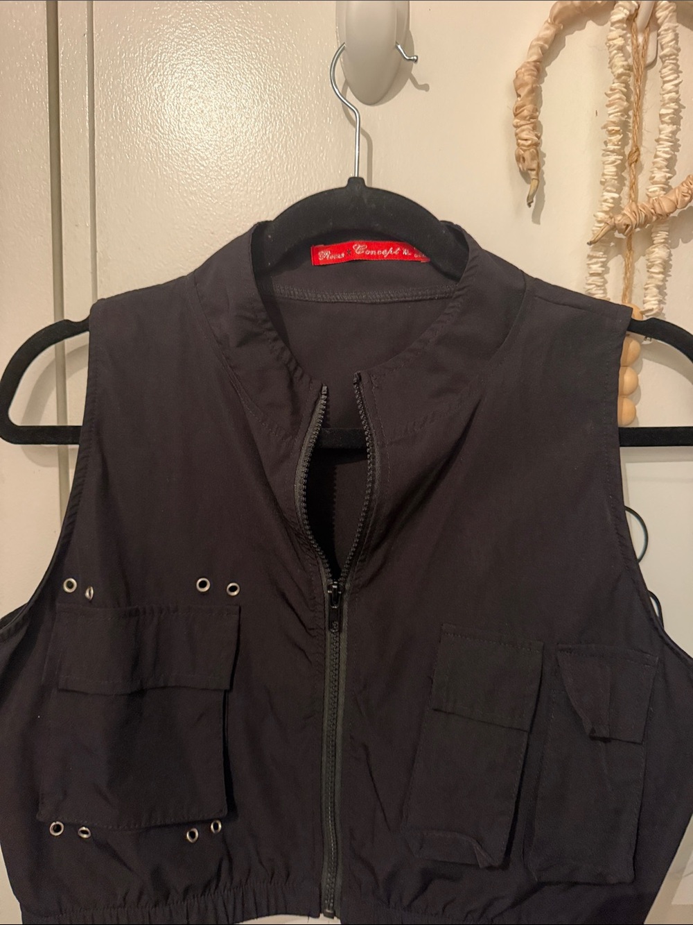 Black Sleeveless Zip Vest with Elastic Hem